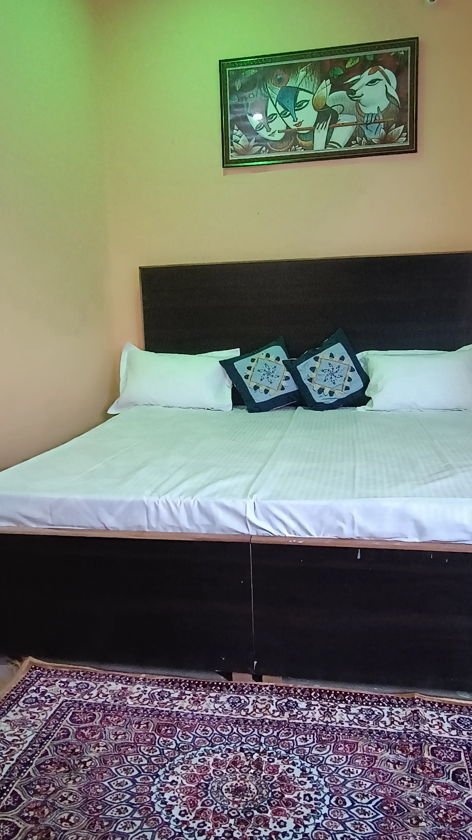 The double bed viewed from the front.
